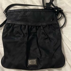 Burberry crossbody bag. Black canvas with zipper and front pocket. EUC